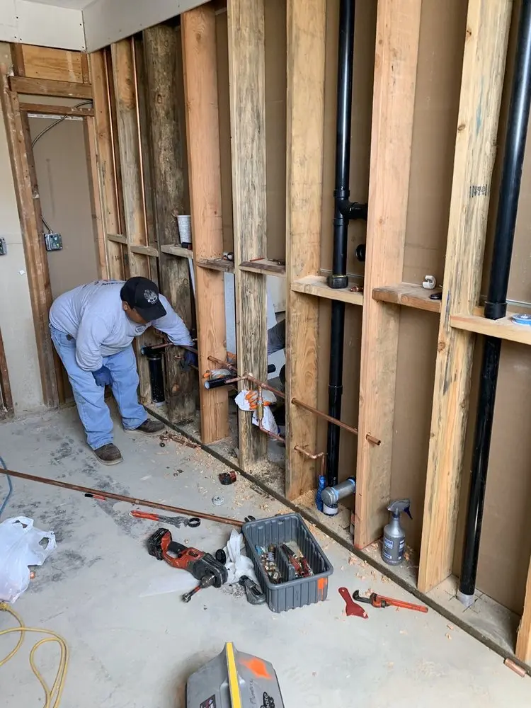 Commercial rough-in plumbing for Water Heater Replacement in Crosstown